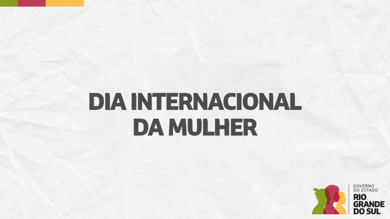 Card em fundo cinza, no qual está escrito Dia Internacional da Mulher ao centro. No canto inferior direito do Card está a logomarca utilizada pela gestão 2023-2026 do governo do Rio Grande do Sul.