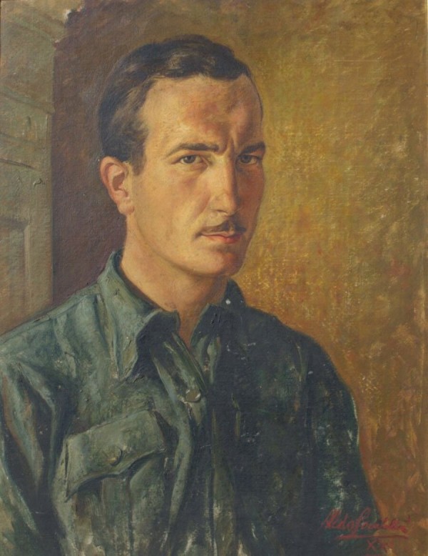 A foto é um close-up da pintura em tela que é um autorretrato de Aldo Locatelli. O retrato mostra o rosto de um homem de meia-idade, com cabelos e bigode escuros, e uma expressão séria. A obra está em uma moldura simples e o fundo da pintura é em tons de marrom e bege.